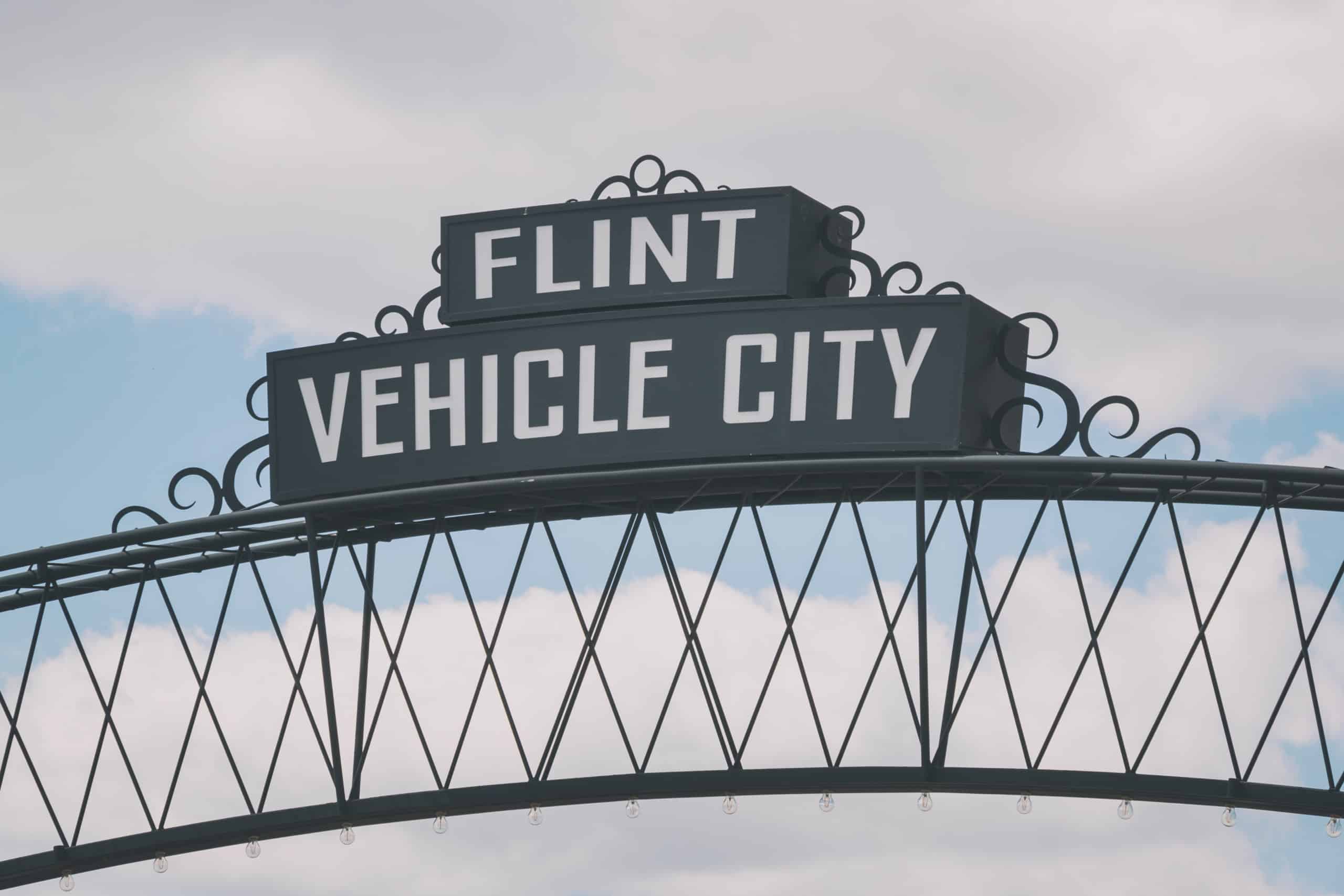 Flint,,michigan,downtown,gateway,sign,showing,vehicle,city.,known,widely