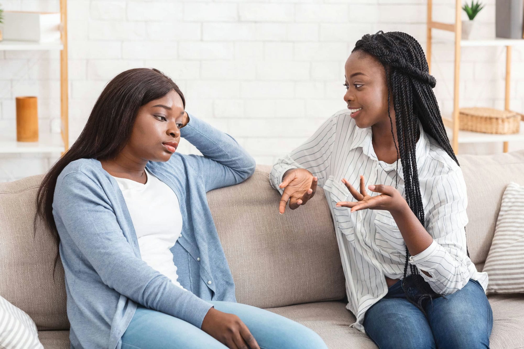 Talkative Friend Concept. Young Black Woman Tired Of Her Girlfriend