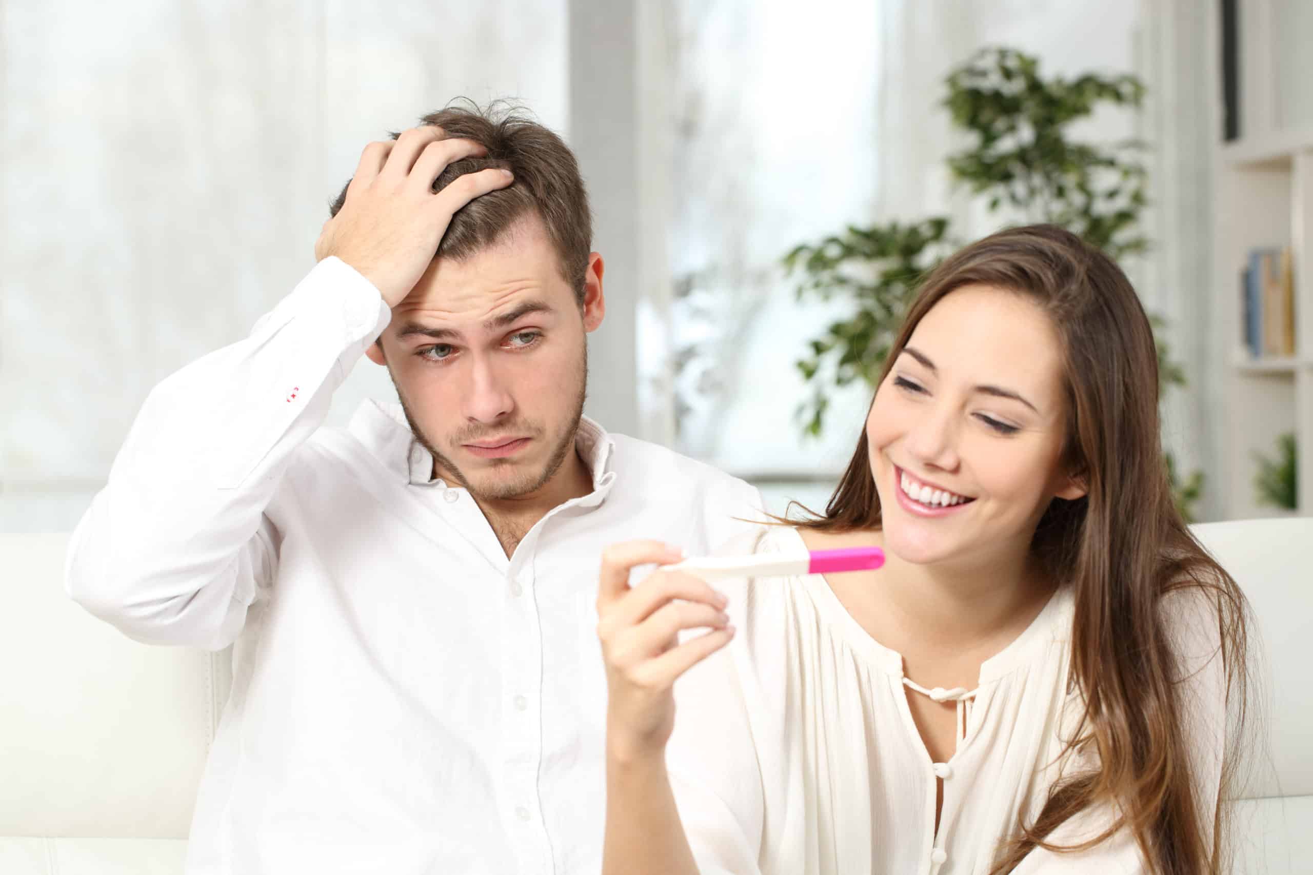 Not Ready Worried Man Checking A Pregnancy Test With His